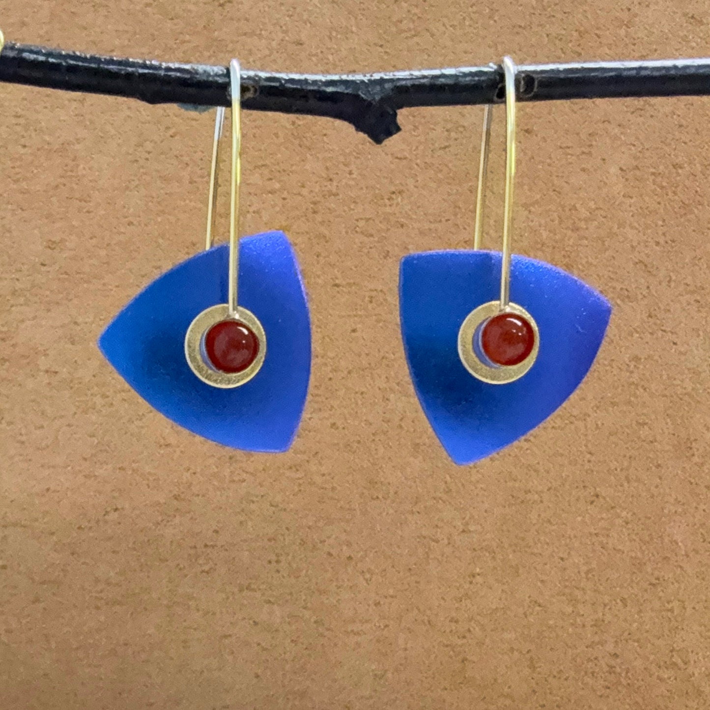 Small Niobium Triangle earrings with Carnelians