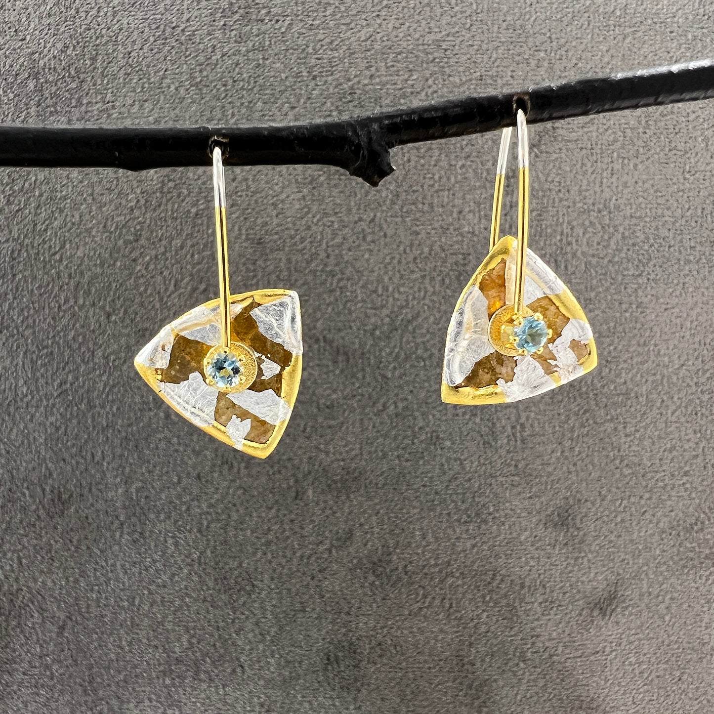 Tiny Mica Triangles