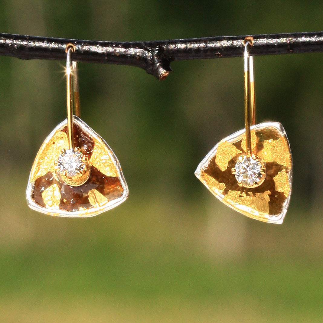 Tiny Mica Triangles
